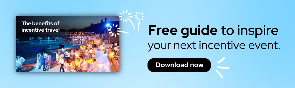 Banner with a festive poolside event at night, text reads The benefits of incentive travel and Free guide to inspire your next incentive travel event. Download now on a blue background with fireworks graphics.