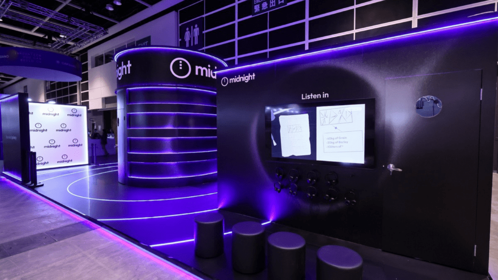 Immersive exhibition stand design by a leading event agency, showcasing event tech and creating a high-impact brand experience at a global blockchain event.