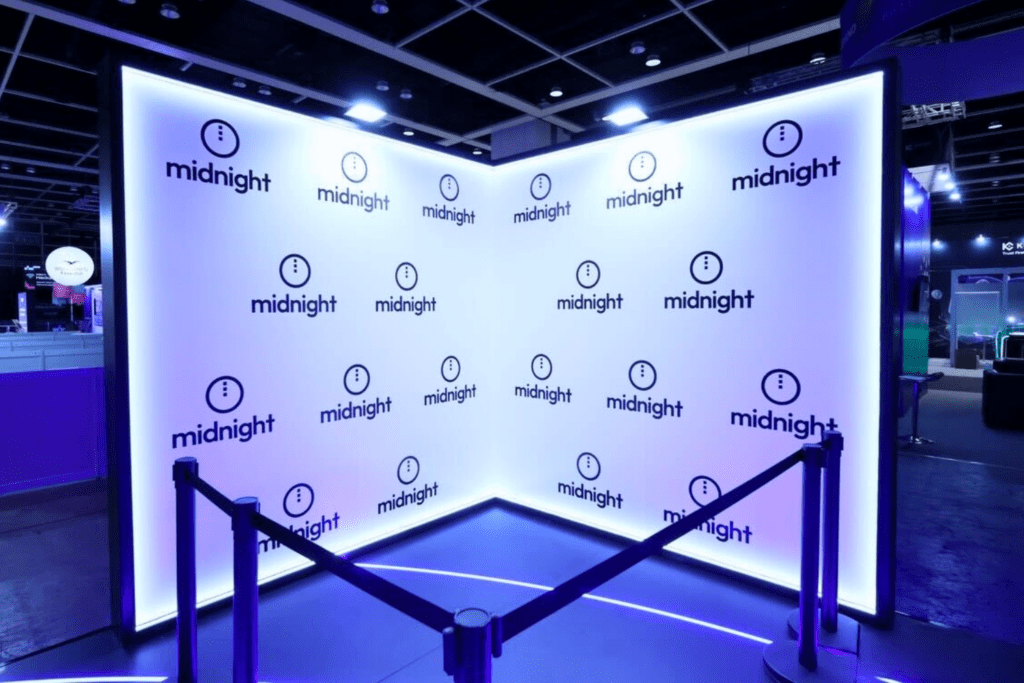 Immersive exhibition stand design by a leading event agency, showcasing event tech and creating a high-impact brand experience at a global blockchain event.