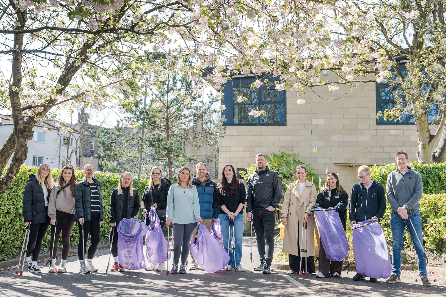 First Event team volunteering on Earth Day, litter picking in the local community as part of sustainability and environmental action initiatives.